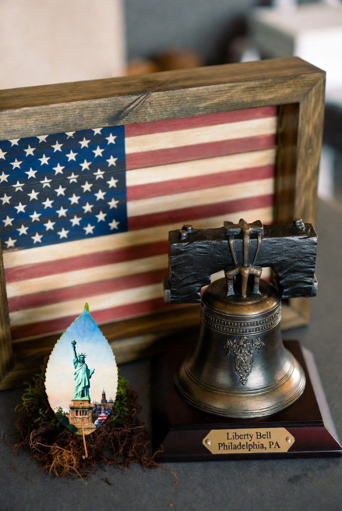 Handcrafted Liberty Bell keepsake and custom leaf portrait with Statue of Liberty, meaningful Patriotic Gifts to honor American pride and history.