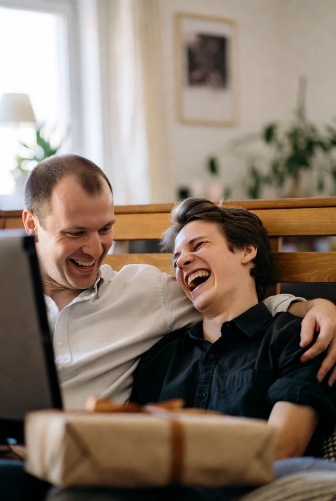 Boyfriend and his dad sharing a happy moment with father's day.